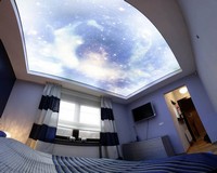 Натяжной потолок с изображением ночного неба, подсвеченного изнутри.